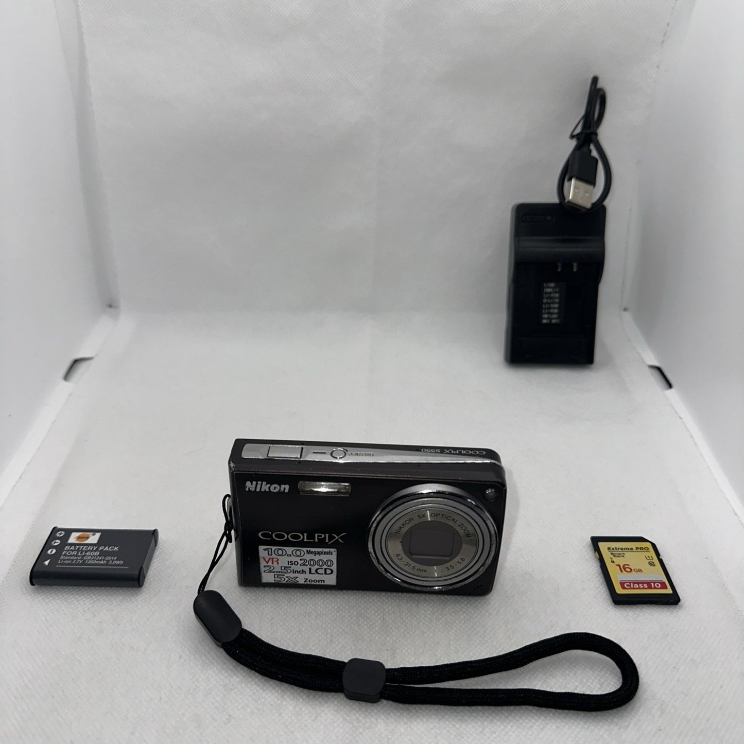 Nikon Coolpix S550 10MP Digital Camera Tested Plus Charger Battery 16GB SD0