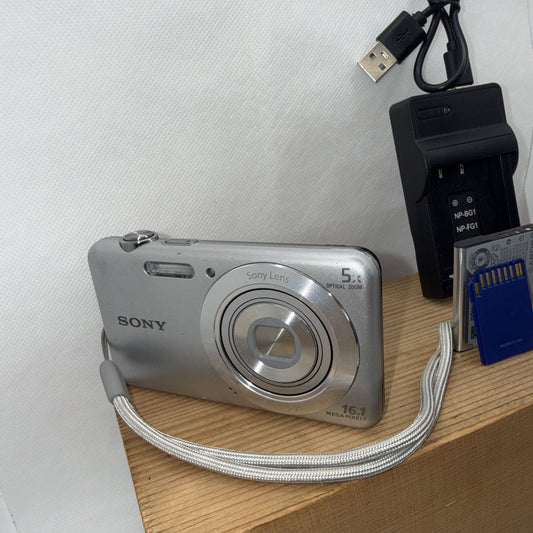Sony Cybershot DSC-W710 16.1MP Digital Camera Working + Charger Battery 32GB