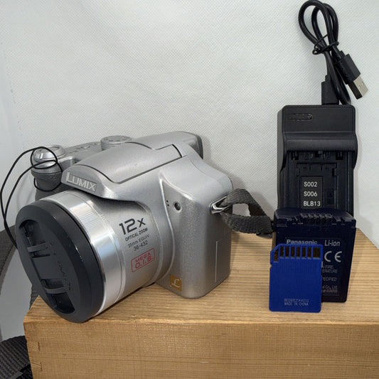 Panasonic Lumix DMC-FZ7 6.0MP Digital Camera Tested + Charger Battery 4GB SD