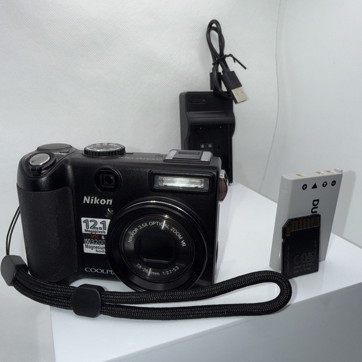 Nikon Coolpix P5100 12.1MP Digital Camera Tested Working + Charger Battery 4GB
