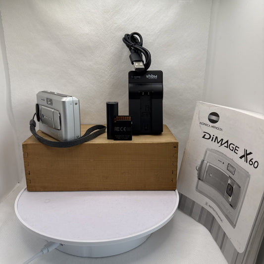 Konica Minolta DiMAGE X60 5MP Digital Camera Working + Charger Battery 4GB SD