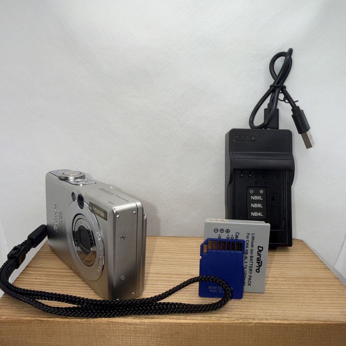 Canon Ixus 60 6MP Digital Camera Tested Plus Charger Battery 2GB SD Card Japan