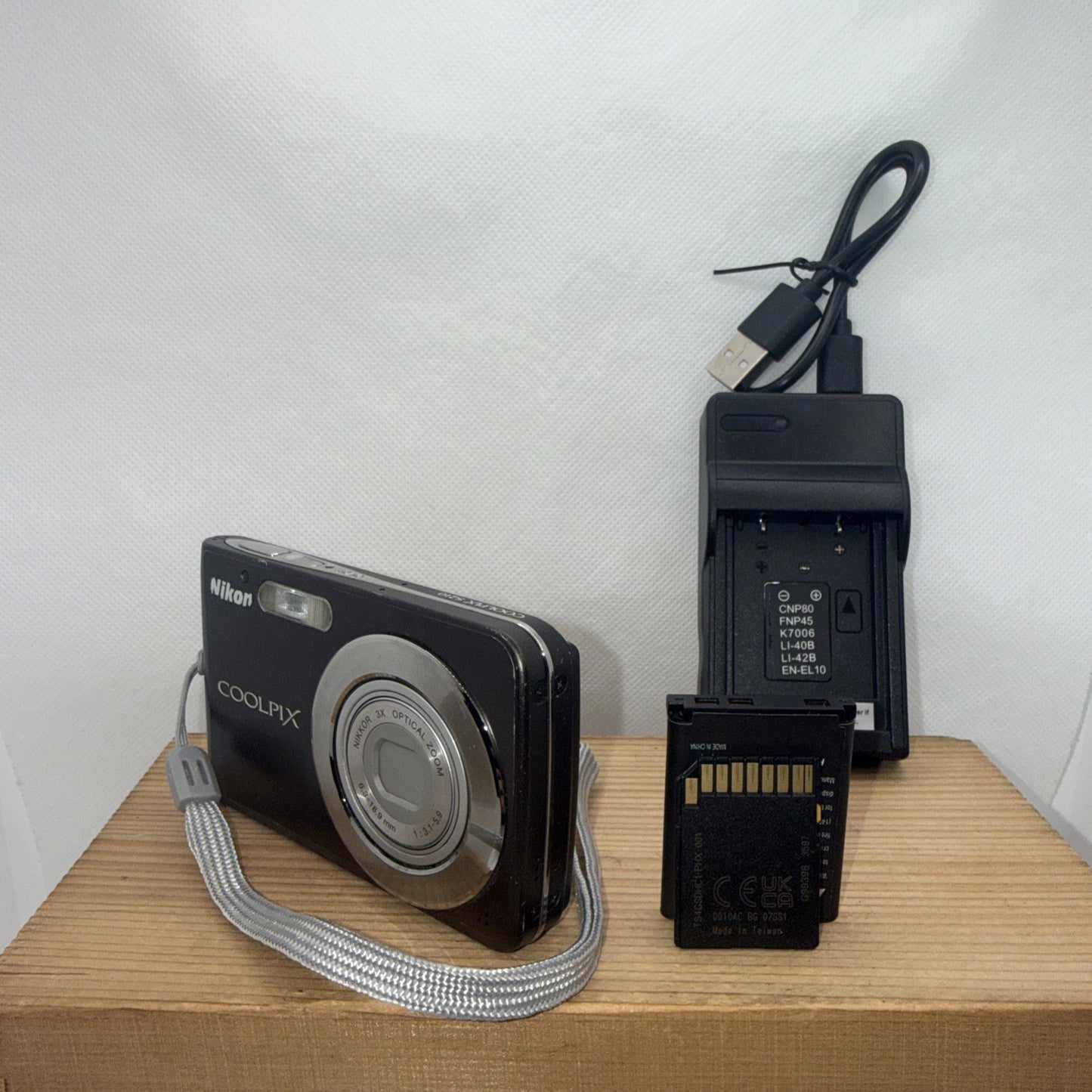 Nikon Coolpix S210 8MP Digital Camera Brown Tested + Charger Battery 4GB SD Card