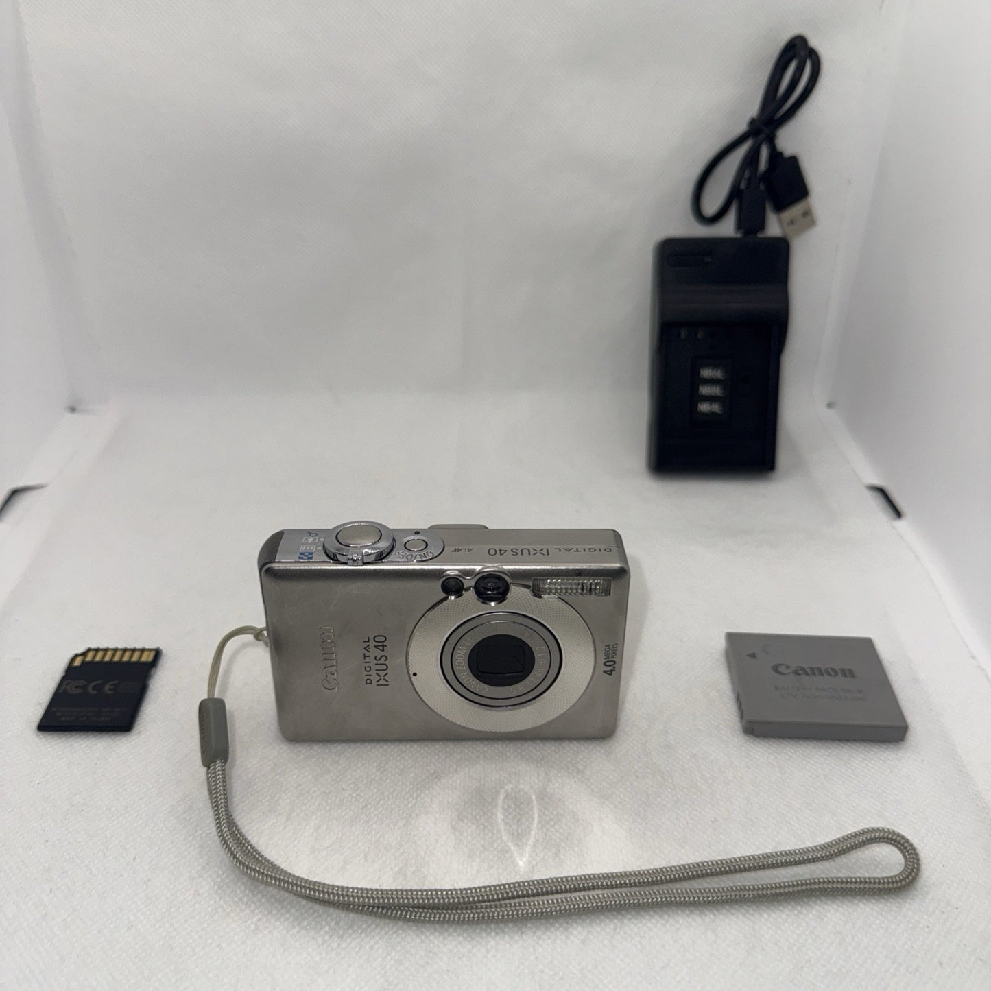 Canon IXUS 40 4.0MP Digital Camera Tested Plus Charger Battery 2GB SD Card Retro0