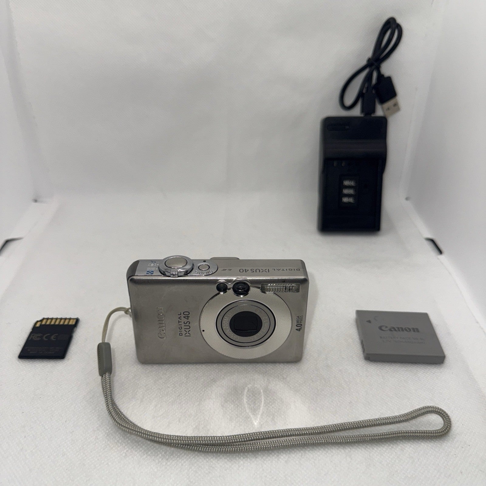 Canon IXUS 40 4.0MP Digital Camera Tested Plus Charger Battery 2GB SD Card Retro0