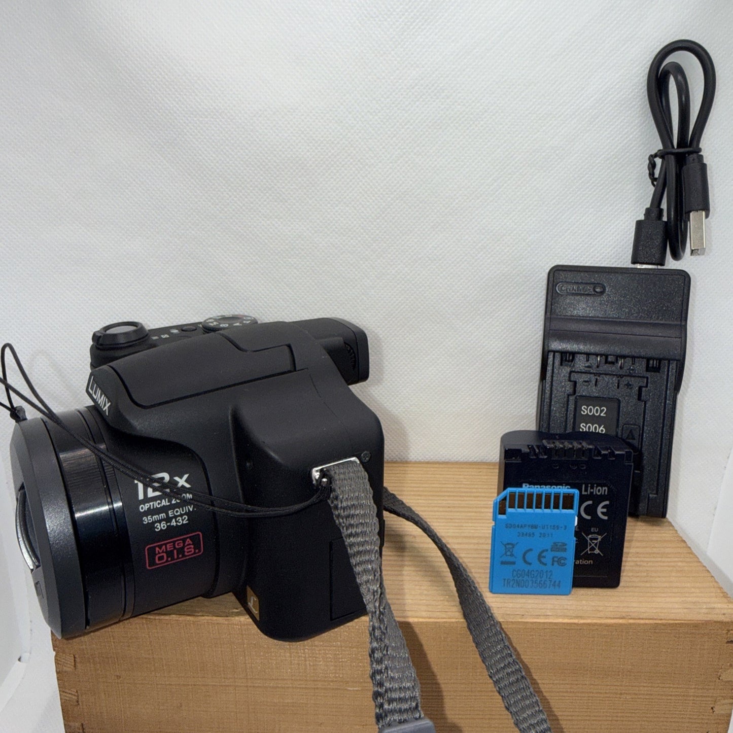 Panasonic DMC-FZ7 6MP Digital Bridge Camera Charger Tested Bundle + Free Gifts