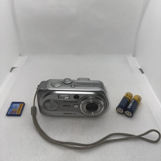 Samsung Digimax A7 7.0MP Digital Camera Tested Plus Batteries And 2GB SD Card0
