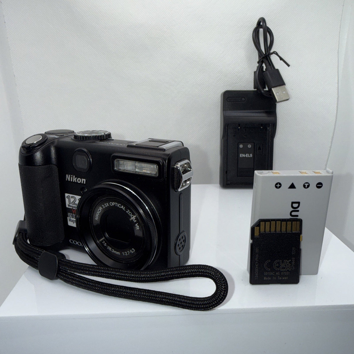 Nikon Coolpix P5100 12.1MP Digital Camera Tested Working + Charger Battery 4GB